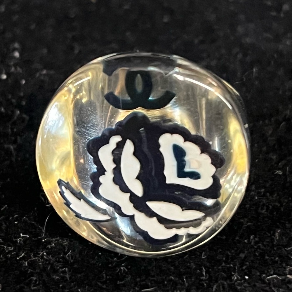 CHANEL Transparent Certified Camellia Ring with Black and White Floral Design